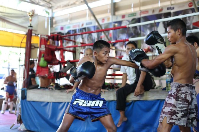 two fighters sparring at sangmorakot gym