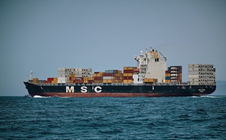 A shipping vessel leaving port.