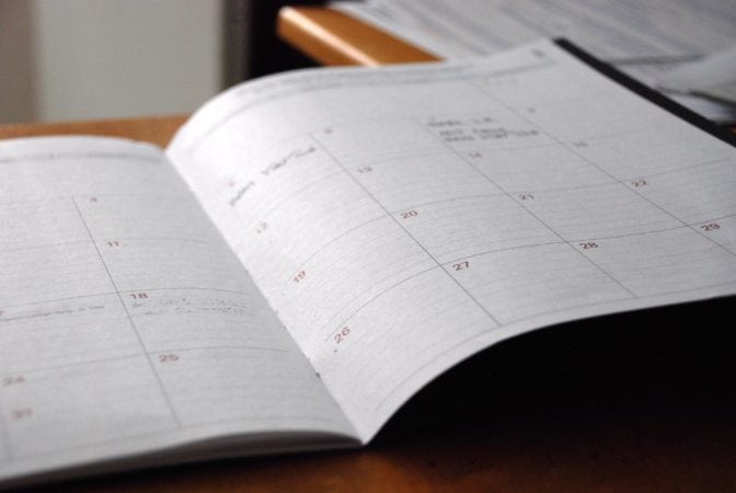 A daily planner opened up.