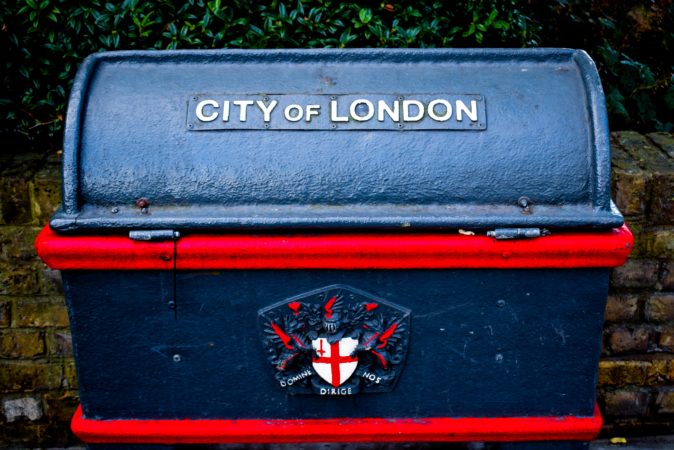A blue and red UK Post box.