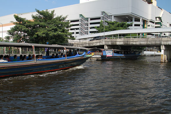 Thai Floods: Six Boats Pushing Flood Water