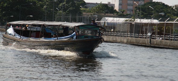 Thai Floods: Six Boats Pushing Flood Water
