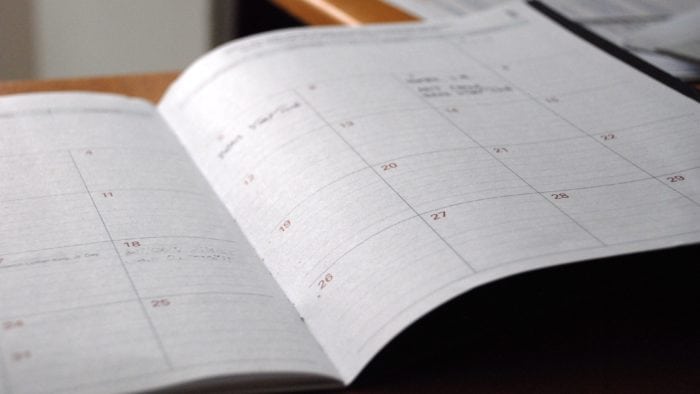 A daily planner opened up.