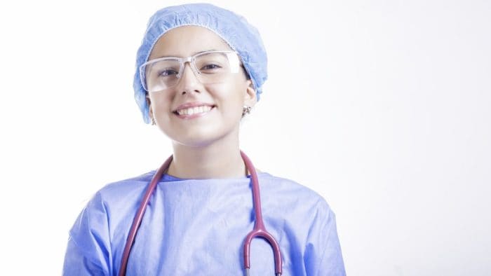 A female Chinese doctor smiling.