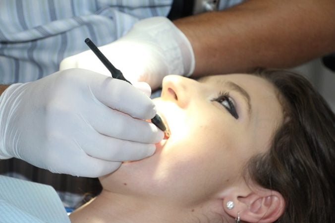 woman getting dental treatment