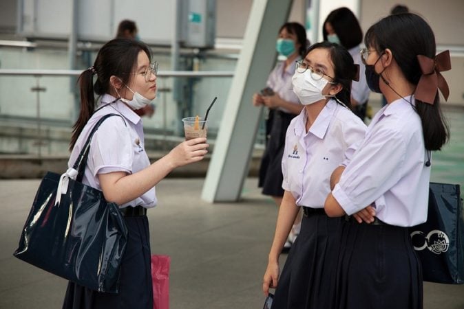 students wearing mask in Bangkok