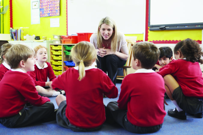 teacher and students in class room