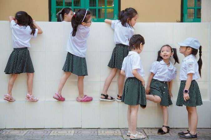 Vietnamese kid in school uniform