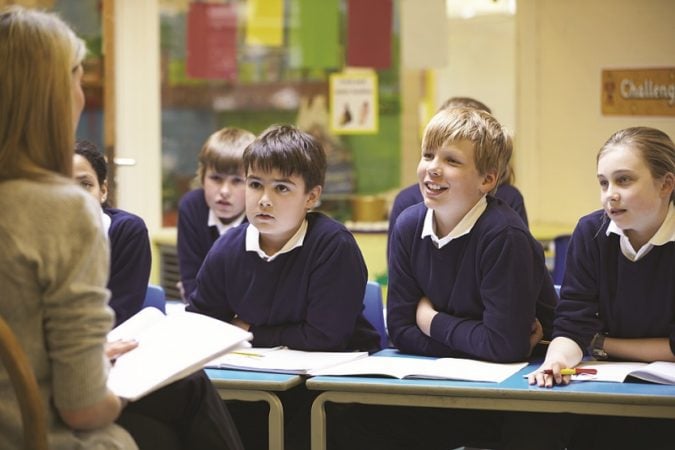 student in a classroom. 