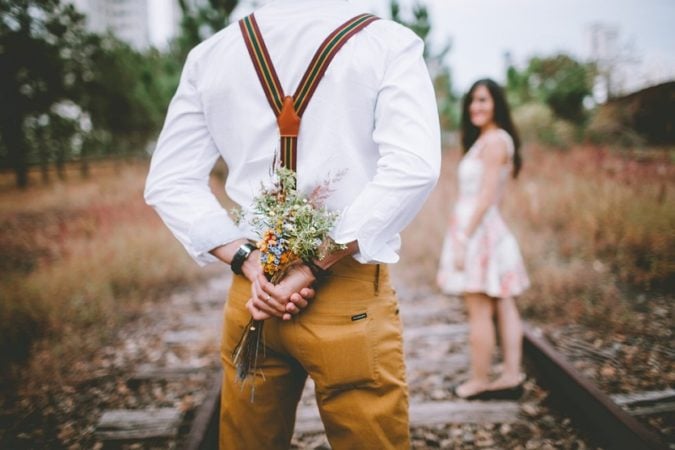 couple holding flowers