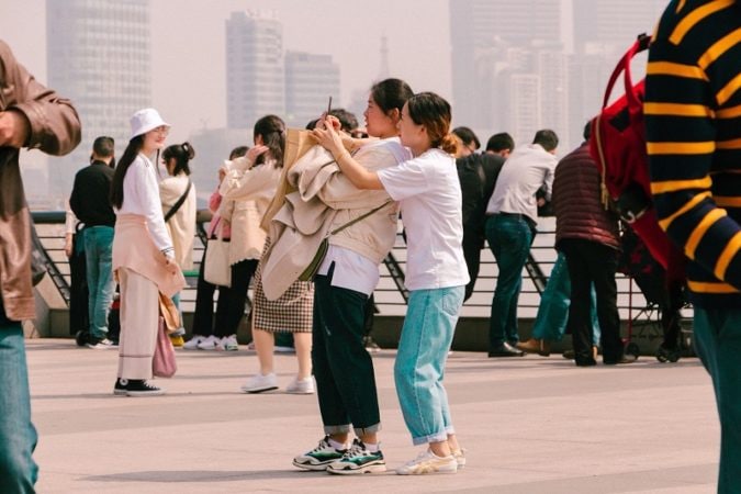 Chinese tourists on the riverside