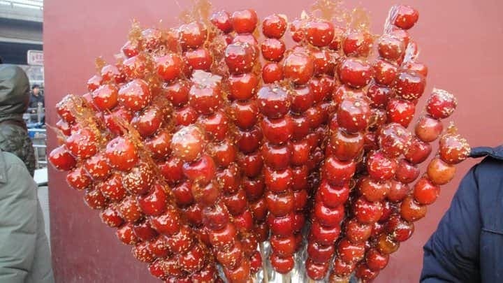 Candied hawthorns being sold on the street in Beijing 