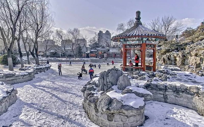 Ritan Park covered in snow in Beijing winter. 