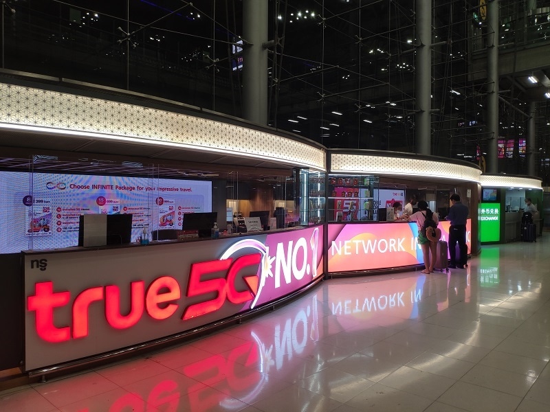 True phone provider shops at Bangkok airport.