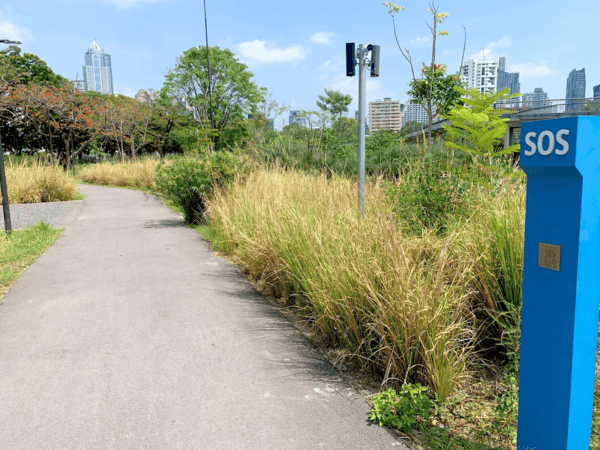 A photo of the SOS call box and security cameras in Benchakitti Forest Park