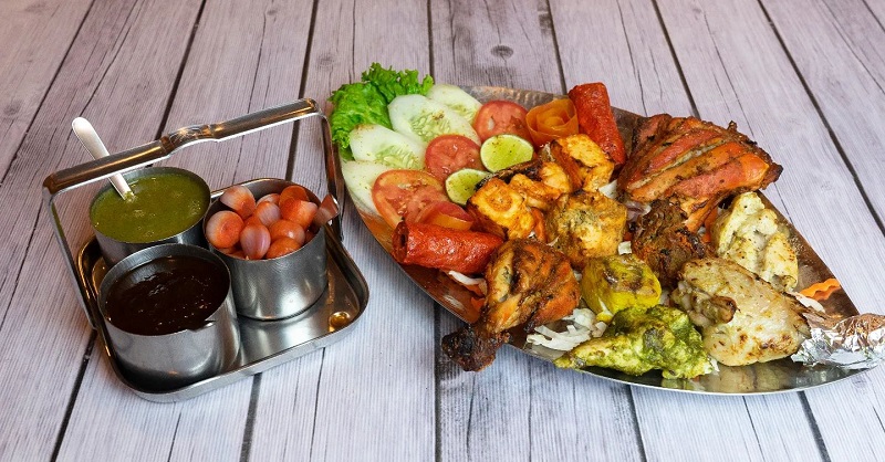 The tandoori platter from New Bukhara’s in Bangkok is the perfect feast to share with friends. 