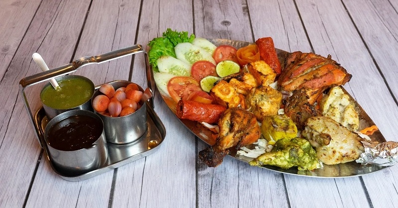 The tandoori platter from New Bukhara’s in Bangkok is the perfect feast to share with friends. 