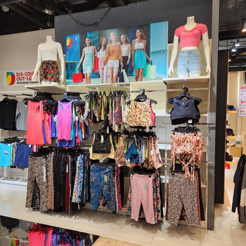 Discount Outlet display of plus sized workout gear .