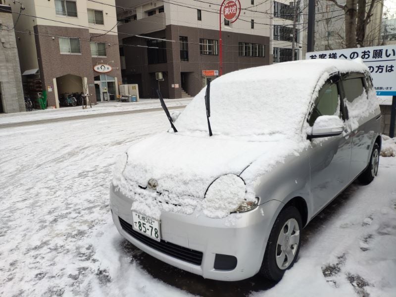 snows on car in Hokkaido