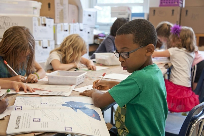 international school children in a classroom