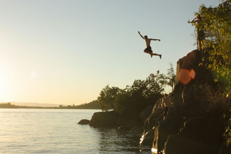 jumping on a cliff in Thailand