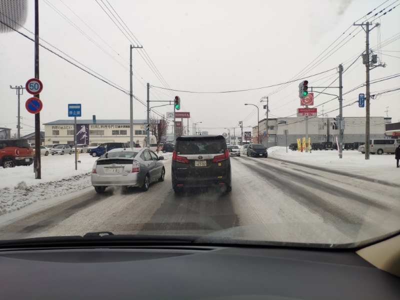 icy road near asahikawa, hokkaido