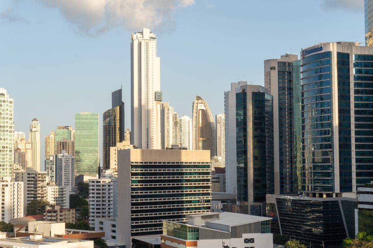 Panama City downtown financial district with modern glass skyscrapers in morning sunlight