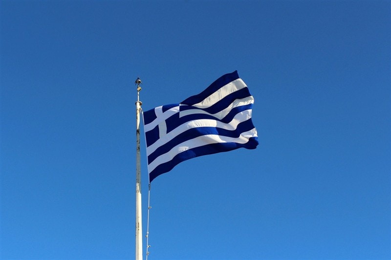 Greek flag flying at the Acropolis in Athens