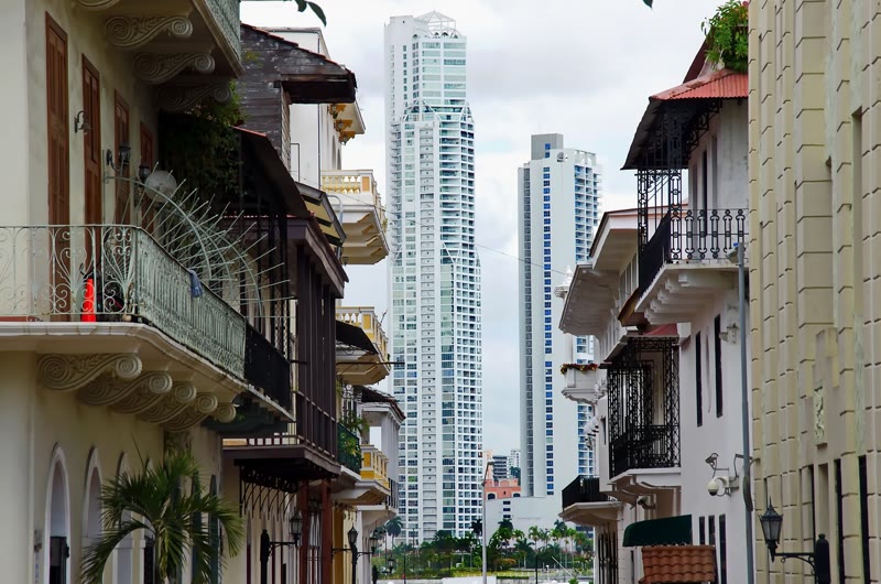 Casco Viejo colonial balconies with modern Panama City towers behind