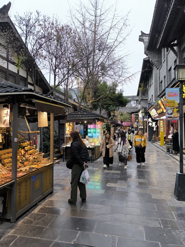 Snack stalls along a traditional pedestrian street in Chengdu