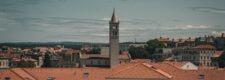 Rooftops and a church bell tower in a Croatian coastal town