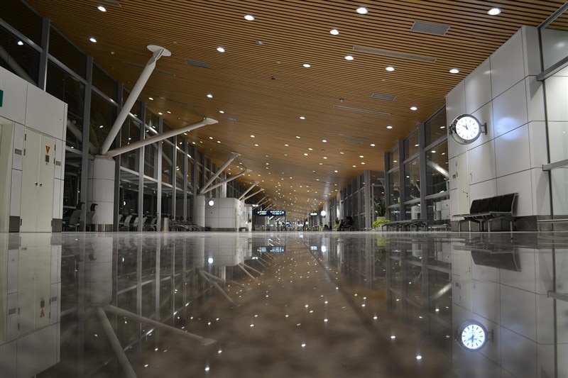 Passengers walking through the departure hall at Kuala Lumpur International Airport