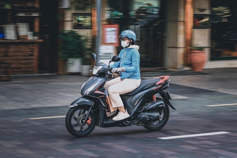Motorbike rider on a street in Ho Chi Minh City