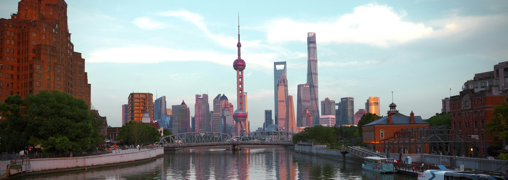 Shanghai's Lujiazui skyline seen from Suzhou Creek at dusk
