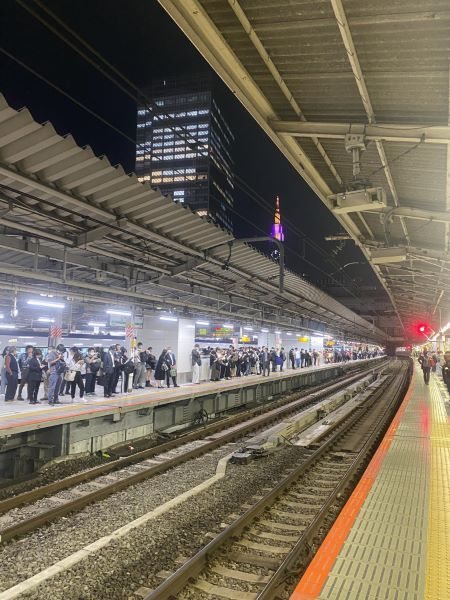 A train platform at night in Japan